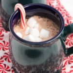 A cup of hot cocoa on a table, with Peppermint
