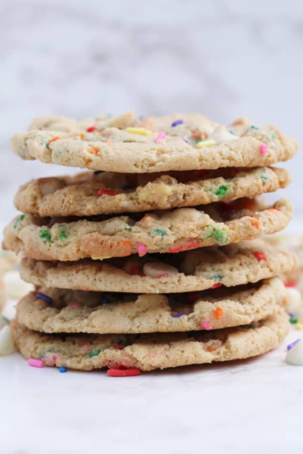 side view of a stack of Flourless Funfetti Cookies
