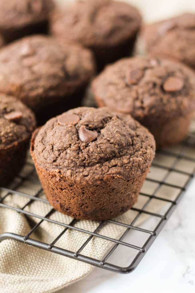 Double Chocolate Oat Muffins on a cooling rack