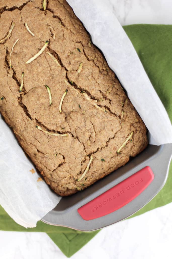 Zucchini Oat Bread in a loaf pan, with a top down view