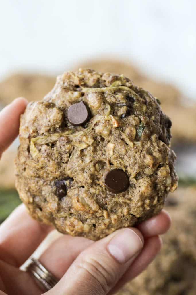 a hand holding up one Zucchini Bread Breakfast Cookie