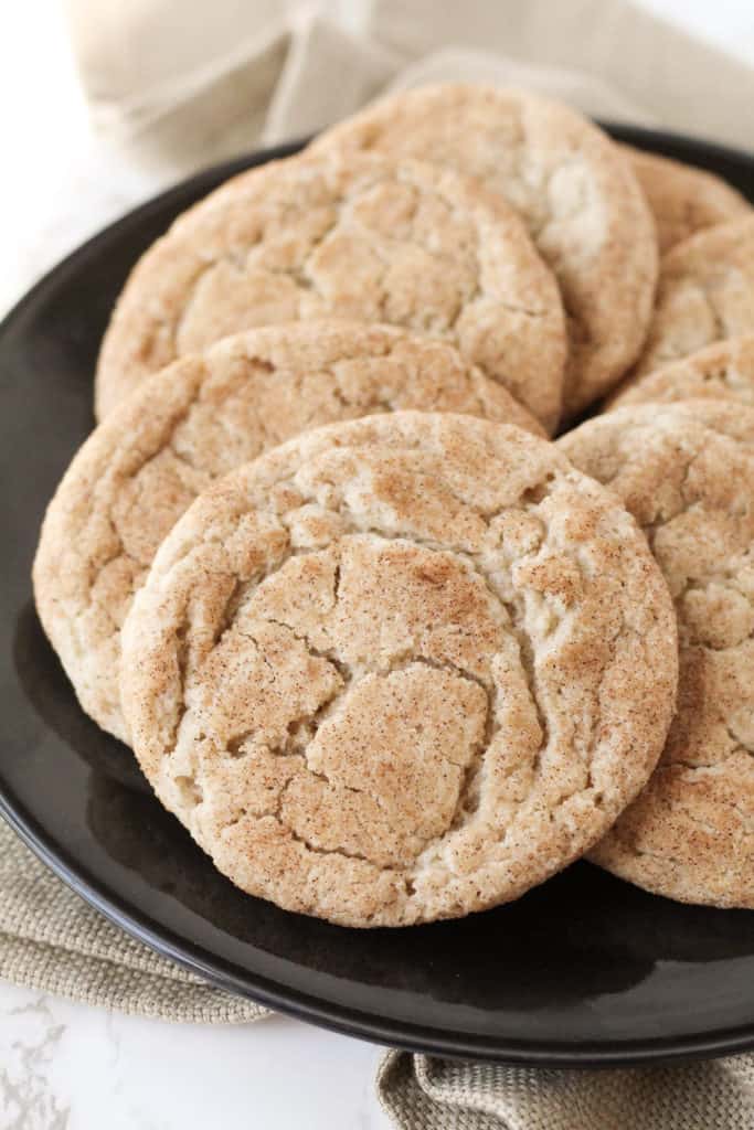 a plate filled with Snickerdoodle Cookies