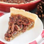 A plate with a slice of pecan pie