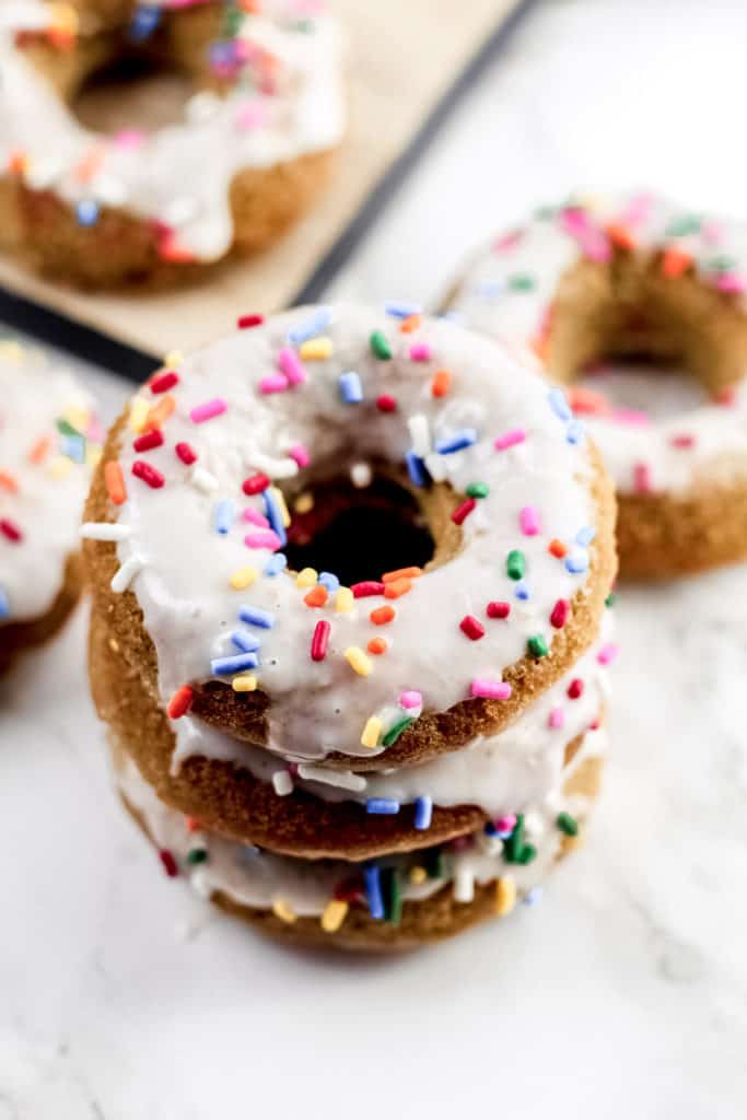 a stack of three Healthy Vanilla Donuts looking from the top down