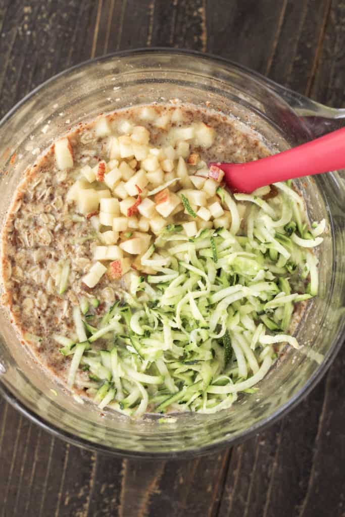 Bowl of oats, apples and shredded zucchini